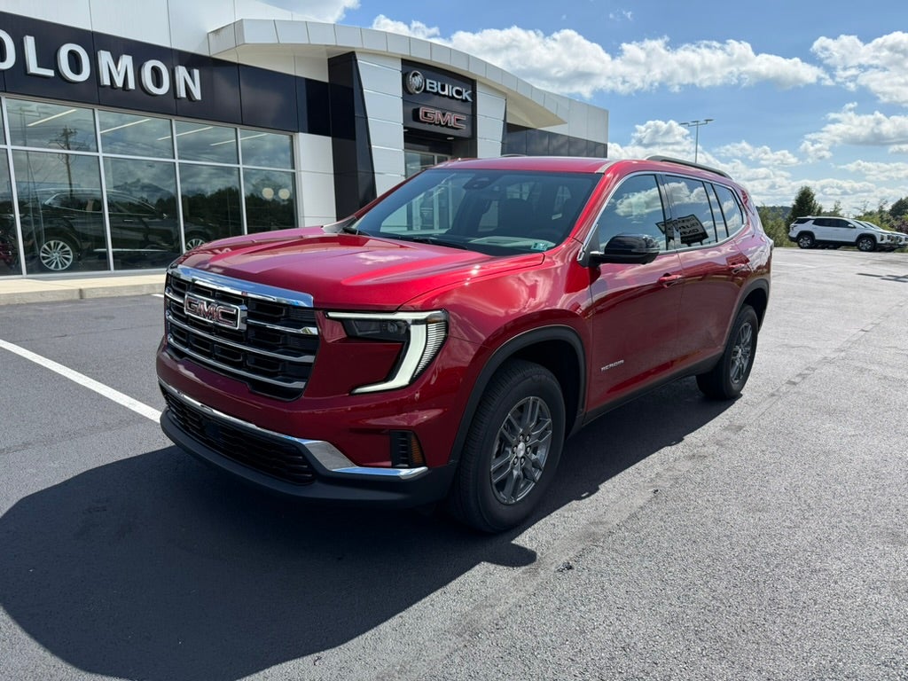 2026 GMC Acadia Elevation in Volcanic Red Tintcoat — front three-quarter view