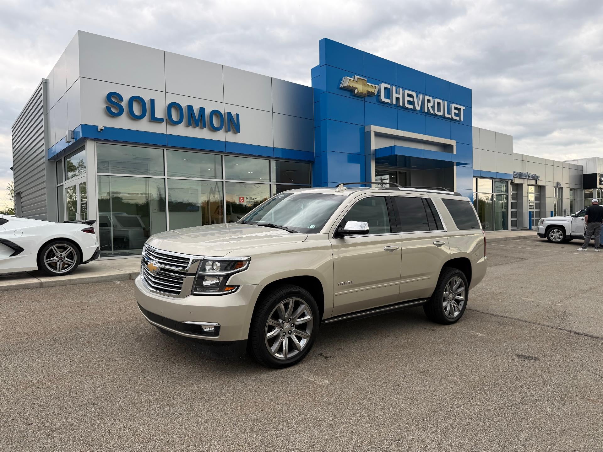 2017 Chevrolet Tahoe Premier in Champagne Silver Metallic — front three-quarter view