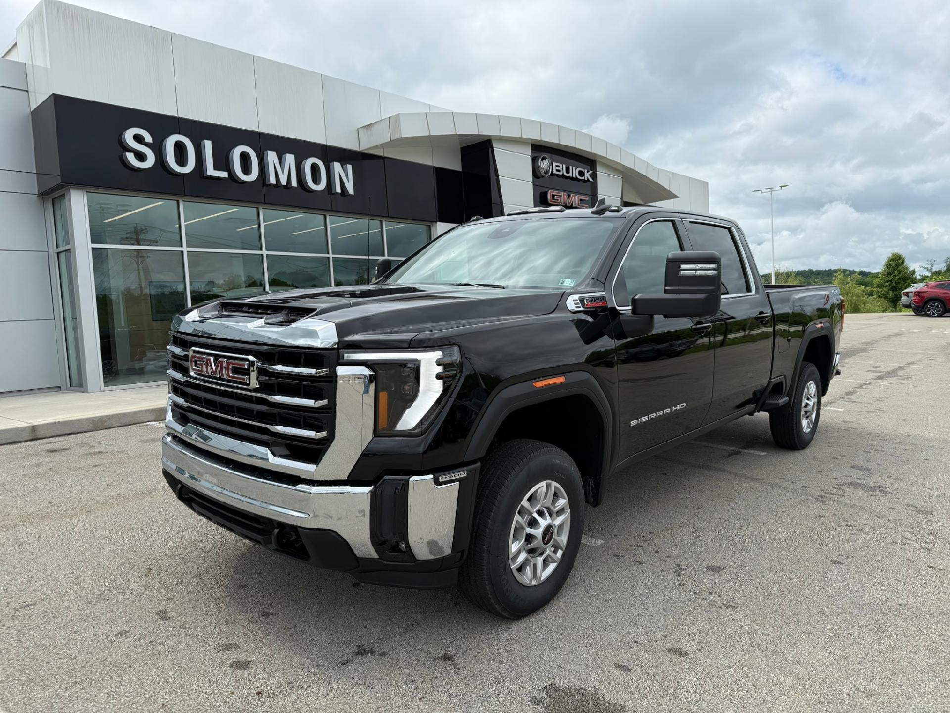 2026 GMC Sierra 2500 HD SLE in Onyx Black — front three-quarter view