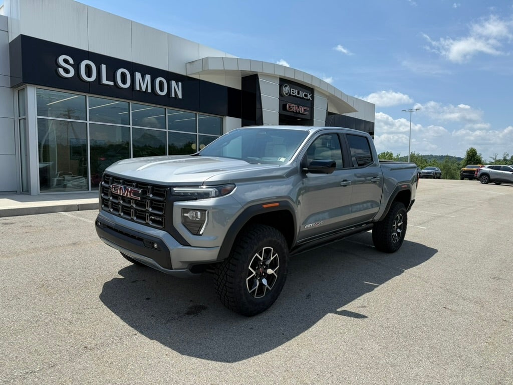2026 GMC Canyon AT4X in Sterling Metallic — front three-quarter view