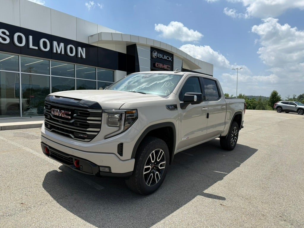 2026 GMC Sierra 1500 AT4 in Coastal Dune — front three-quarter view