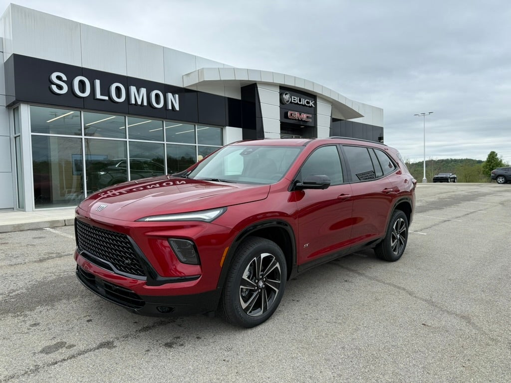 2026 Buick Enclave Sport Touring in Cherry Red Tintcoat — front three-quarter view