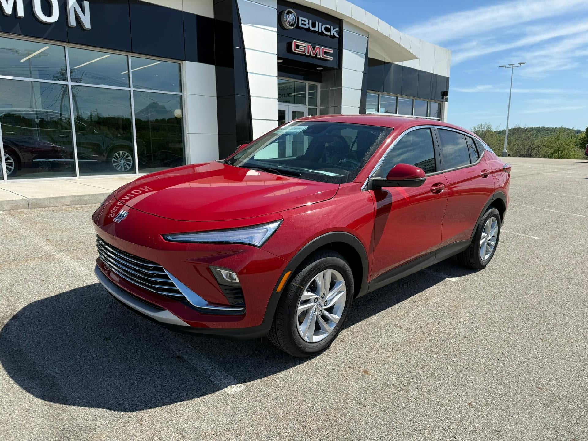 2026 Buick Envista Preferred in Brilliant Red — front three-quarter view