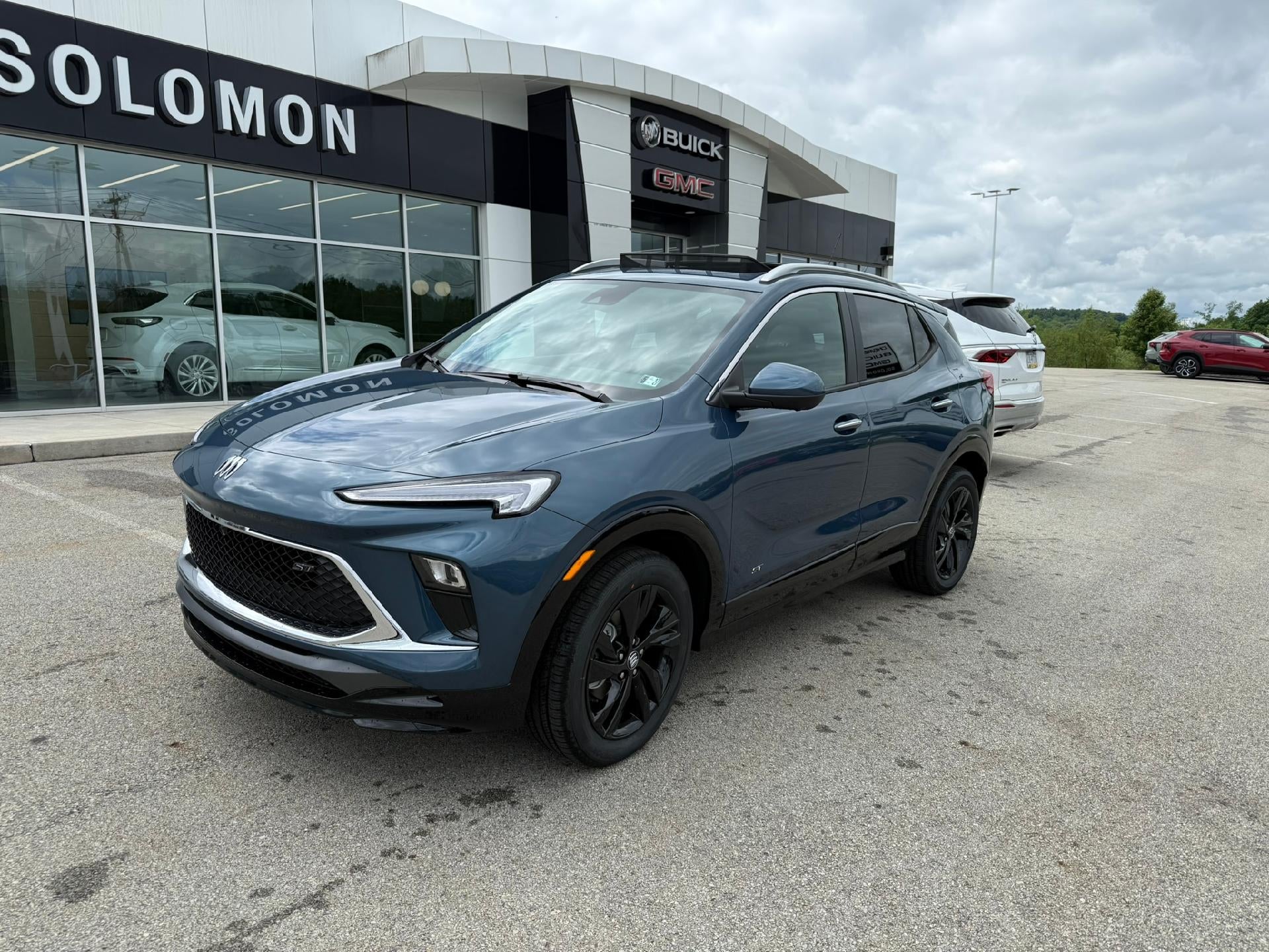 2026 Buick Encore GX Sport Touring in Ocean Blue Metallic — front three-quarter view