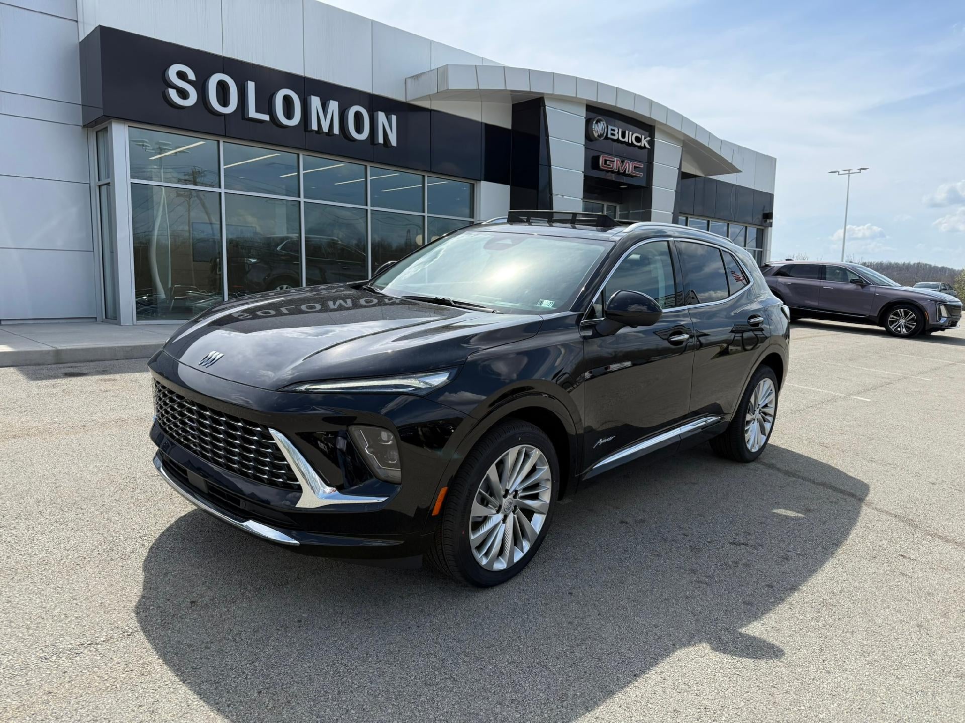 2026 Buick Envision Avenir in Ebony Twilight Metallic — front three-quarter view